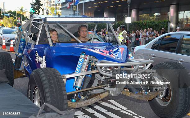 Actors Kristen Bell and Dax Shepard arrive to the premiere of Open Road Films' "Hit and Run" on August 14, 2012 in Los Angeles, California.