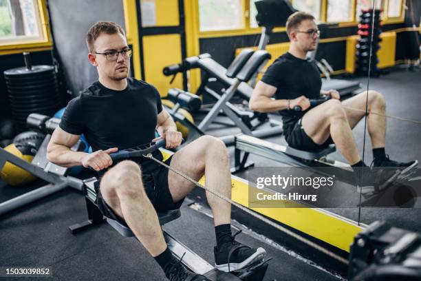 Male Rowing Machine 670 Man Rowing Machine Stock Photos, High-Res Pictures, and Images ...