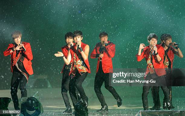 Members of South Korean boy band Infinite perform onstage during at KBS London Olympic Athletes Welcomed The National Festival on August 14, 2012 in...