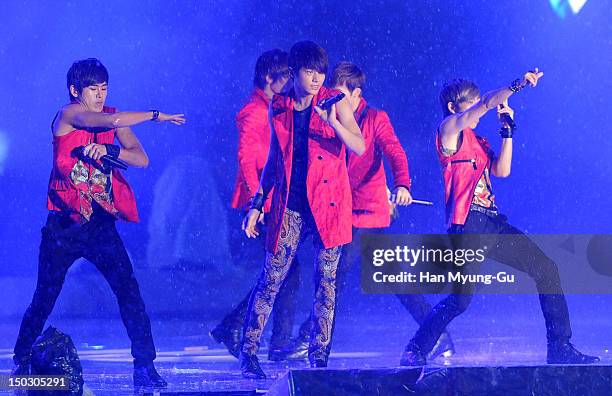 Members of South Korean boy band Infinite perform onstage during at KBS London Olympic Athletes Welcomed The National Festival on August 14, 2012 in...