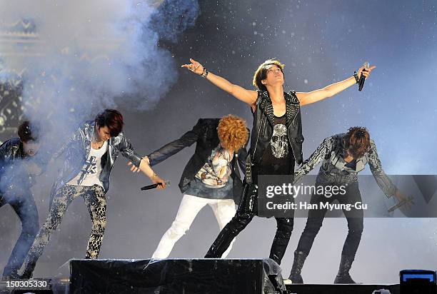 Members of South Korean boy band EXO-K perform onstage during at KBS London Olympic Athletes Welcomed The National Festival on August 14, 2012 in...