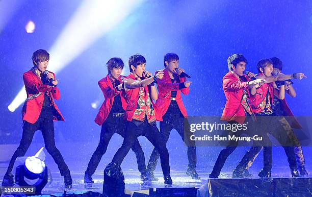 Members of South Korean boy band Infinite perform onstage during at KBS London Olympic Athletes Welcomed The National Festival on August 14, 2012 in...