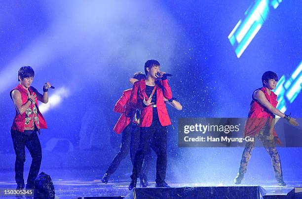 Members of South Korean boy band Infinite perform onstage during at KBS London Olympic Athletes Welcomed The National Festival on August 14, 2012 in...