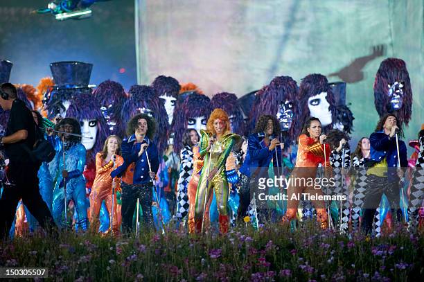Summer Olympics: View of dancers representing British popular culture during "Frankie and June say...thanks Tim" segment at Olympic Stadium. London,...