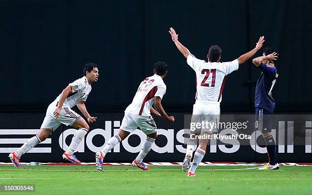 Nicolas Fedor of Venezuela celebrates his goal against Japan with team-mates during the international friendly match between Japan and Venezuela at...