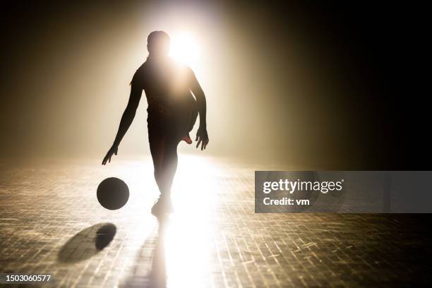female basketball player silhouette training - basketball player stock pictures, royalty-free photos & images