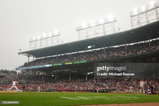 Jameson Taillon of the Chicago Cubs delivers a pitch to Nick Castellanos of the Philadelphia Phillies during the first inning at Wrigley Field on...