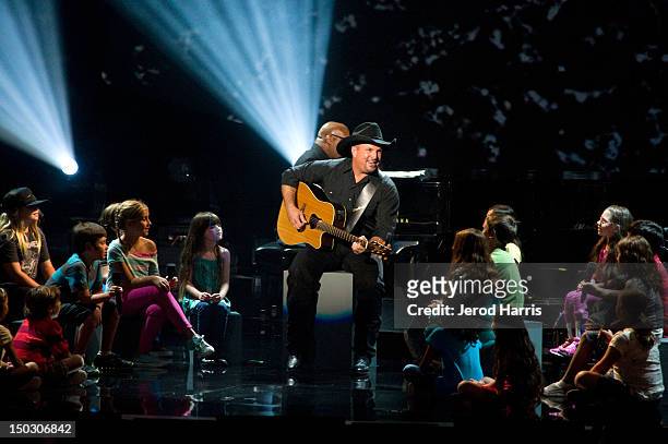 Garth Brooks performs onstage at the 'Teachers Rock' benefit event held at Nokia Theatre L.A. Live on August 14, 2012 in Los Angeles, California.