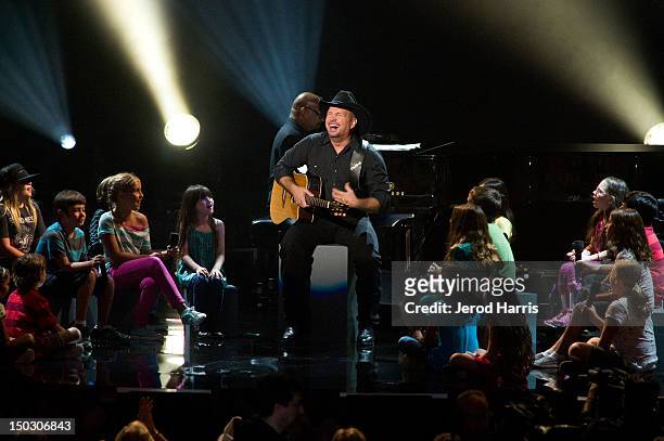 Garth Brooks performs onstage at the 'Teachers Rock' benefit event held at Nokia Theatre L.A. Live on August 14, 2012 in Los Angeles, California.