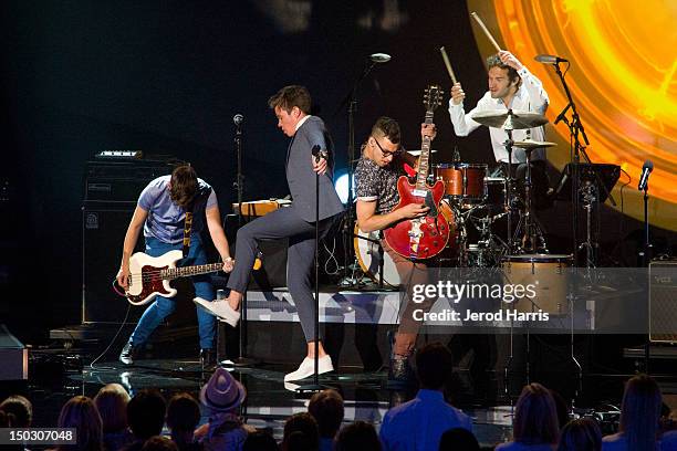 Nate Ruess, Andrew Dost, Jack Antonoff of the band fun. Perform onstage at the 'Teachers Rock' benefit event held at Nokia Theatre L.A. Live on...