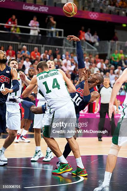 Summer Olympics: USA Kobe Bryant in action, shot vs Lithuania Jonas Valanciunas during Men's Preliminary Round - Group A game at Basketball Arena....