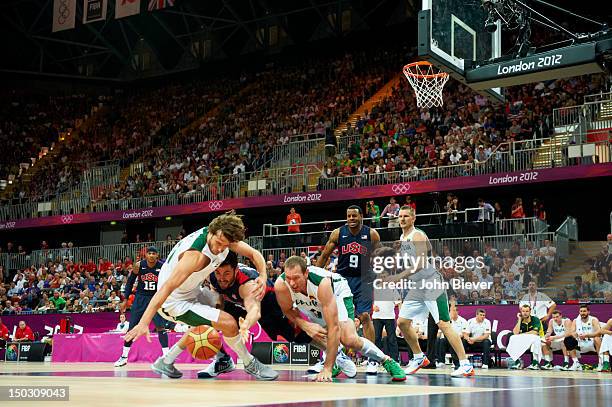 Summer Olympics: USA Kevin Love in action, diving after loose ball vs Lithuania during Men's Preliminary Round - Group A game at Basketball Arena....