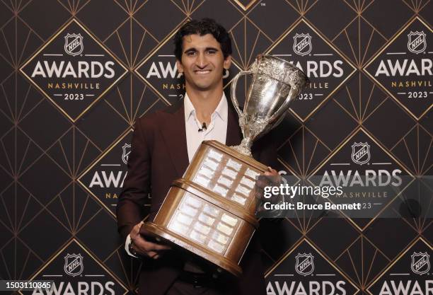 Matty Beniers of the Seattle Kraken holds the Calder Cup during the 2023 NHL Awards at Bridgestone Arena on June 26, 2023 in Nashville, Tennessee.