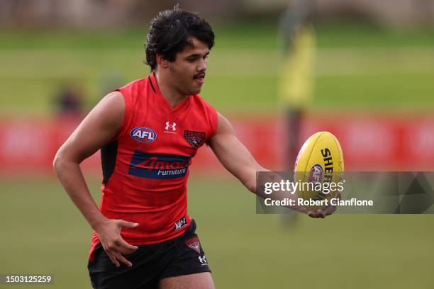 Jayden Davey of the Bombers controls the ball during an Essendon Bombers AFL training session at The Hangar on June 28, 2023 in Melbourne, Australia.