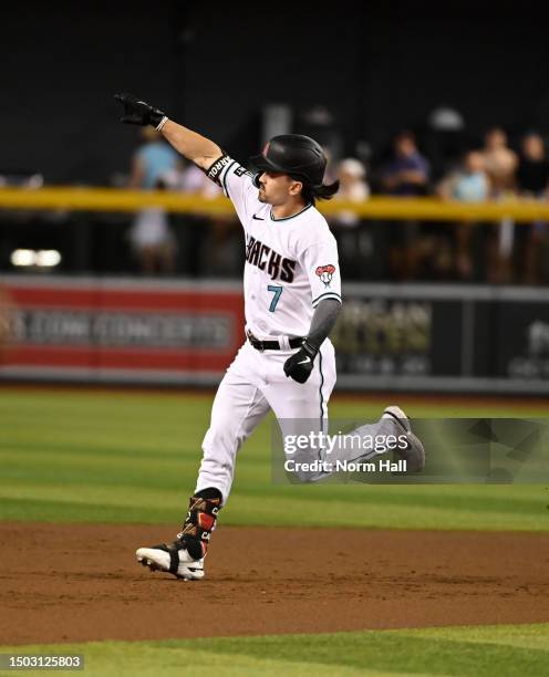 Corbin Carroll of the Arizona Diamondbacks rounds the bases after hitting a three-run home run during the first inning against the Tampa Bay Ray sat...