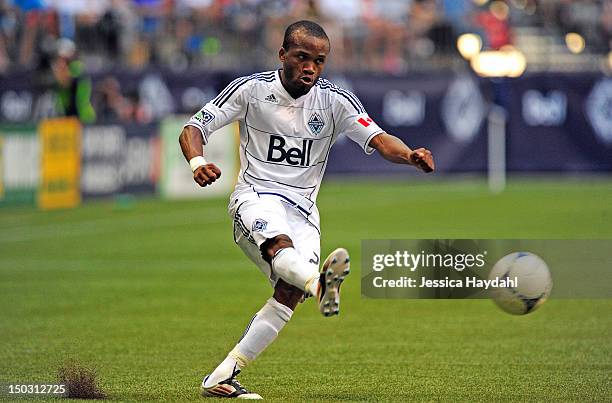 Dane Richards of the Vancouver Whitecaps kicks the ball durning his game against Real Salt Lake at B.C. Place on August 11, 2012 in Vancouver,...