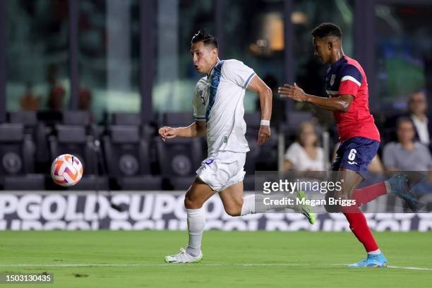 Rubio Rubin of Guatemala and Yosel Piedra of Cuba compete for the ball during the first half at DRV PNK Stadium on June 27, 2023 in Fort Lauderdale,...