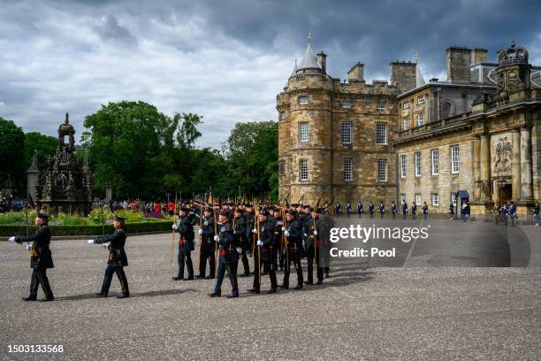 Members of the Royal Company of Archers outside the Palace of Holyroodhouse, Edinburgh, following the National Service of Thanksgiving and Dedication...