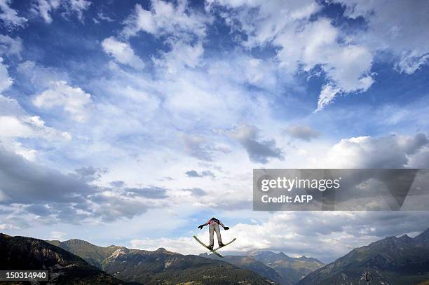 Skier competes during the 22th edition of the summer ski jumping world cup Courchevel Grand prix, on August 15, 2012 in Courchevel, French Alps. AFP...