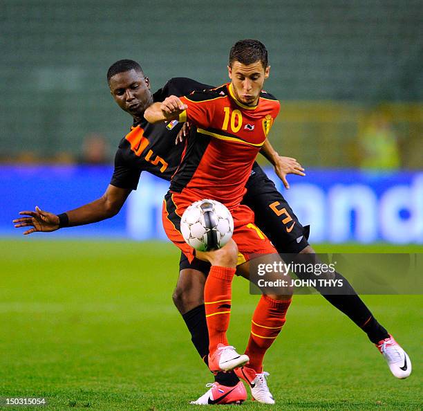 Belgium's Eden Hazard and Netherlands' Jetro Willems fight for the ball during their friendly football match in Brussels on August 15, 2012. AFP...