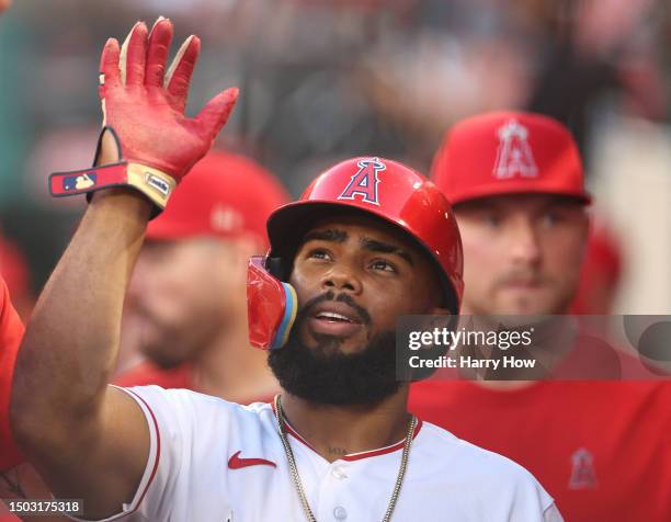 Luis Rengifo of the Los Angeles Angels celebrates his run in the dugout, to take a 2-0 lead over the Chicago White Sox, during the fourth inning at...