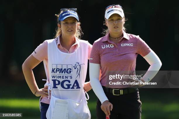Brooke Henderson of Canada and caddie Brittany Henderson wait to putt on the second green during the final round of the KPMG Women's PGA Championship...