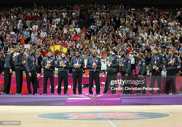 United States poses with their gold medals following the Men's Basketball gold medal game against Spain on Day 16 of the London 2012 Olympics Games...