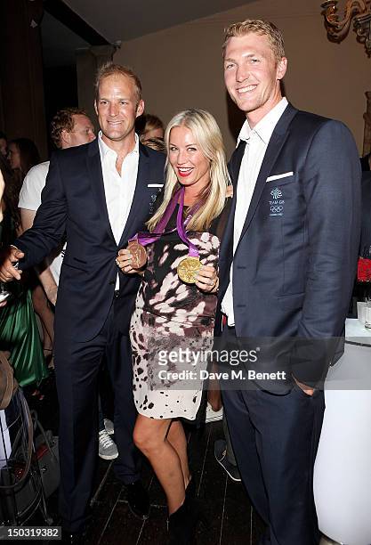 Denise Van Outen poses with Alex Partridge and Alex Gregory at the Samsung Galaxy Note 10.1 launch party at One Mayfair on August 15, 2012 in London,...