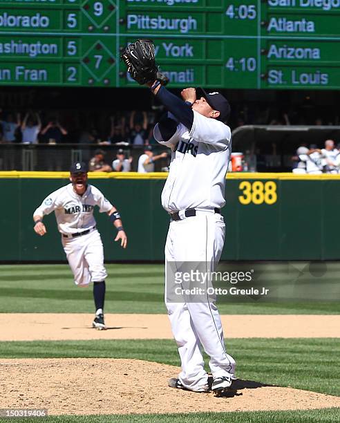 Starting pitcher Felix Hernandez of the Seattle Mariners celebrates after throwing a perfect game against the Tampa Bay Rays at Safeco Field on...