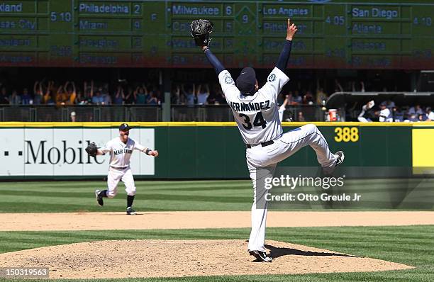 Starting pitcher Felix Hernandez of the Seattle Mariners celebrates after throwing a perfect game against the Tampa Bay Rays at Safeco Field on...