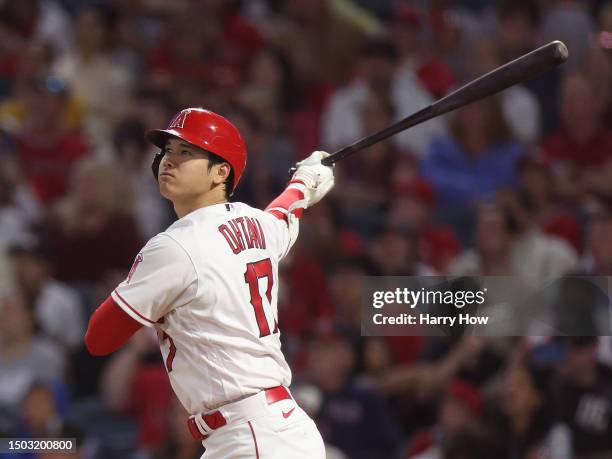 Shohei Ohtani of the Los Angeles Angels watches his opposite field solo homerun, to take a 3-1 lead over the Chicago White Sox, during the seventh...