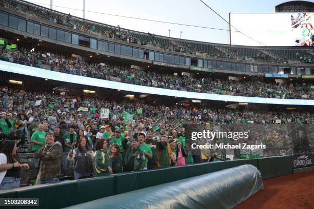 Fans of the Oakland Athletics take part in a reverse boycott during the game against the Tampa Bay Rays at RingCentral Coliseum on June 13, 2023 in...