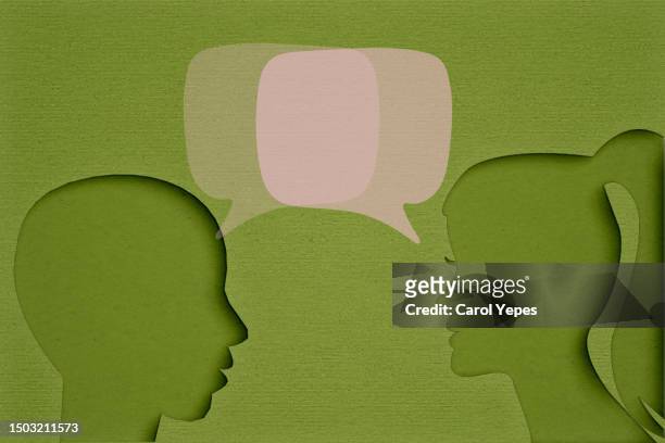people  talking with bubbles speech in felt.green background - speech stock pictures, royalty-free photos & images