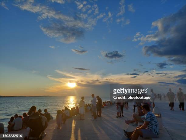 sunset in zadar, croatia - bluefootage fotografías e imágenes de stock