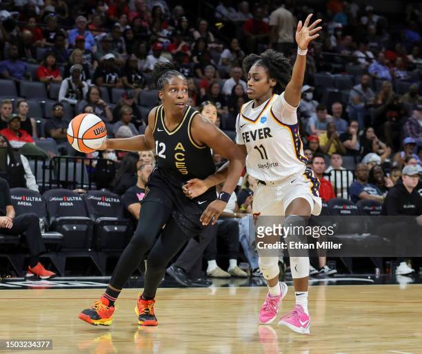 Chelsea Gray of the Las Vegas Aces drives against Maya Caldwell of the Indiana Fever in the second quarter of their game at Michelob ULTRA Arena on...