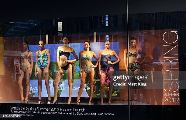 Models showcase swimwear designs at the David Jones Elizabeth Street Store on August 16, 2012 in Sydney, Australia.