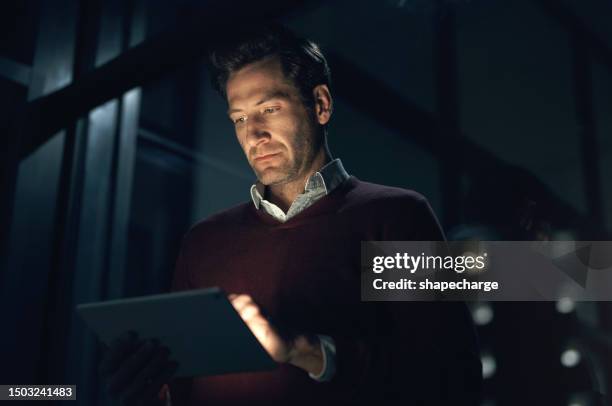 night, business and man with a tablet, internet and connection with digital planning, cyber security and deadline male person, dark or web designer with technology, software update and online reading - network security stock pictures, royalty-free photos & images