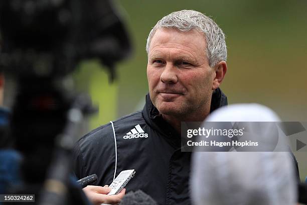 Coach Ricki Herbert talks to media during a Wellington Phoenix A-League training session at Newtown Park on August 16, 2012 in Wellington, New...