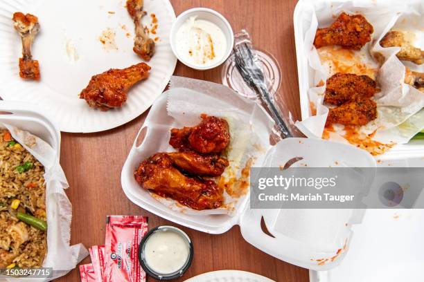 The garlic-parmesan and hot wings with lemon pepper seasoning at American Deli are photographed for Los Angeles Times during a food crawl with actor...