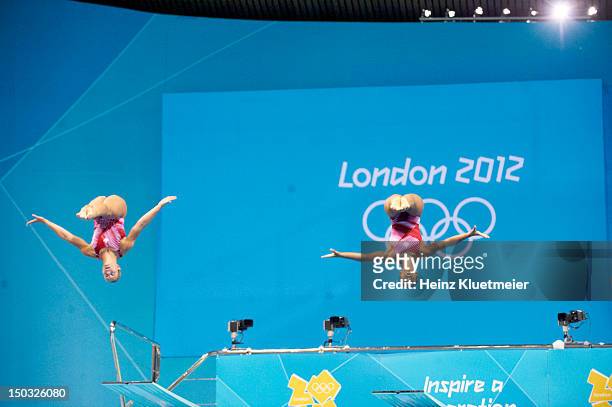 Summer Olympics: Canada Emilie Heymans and Jennifer Abel in action during Women's Synchronized 3M Springboard at Aquatics Centre. Canada won bronze....