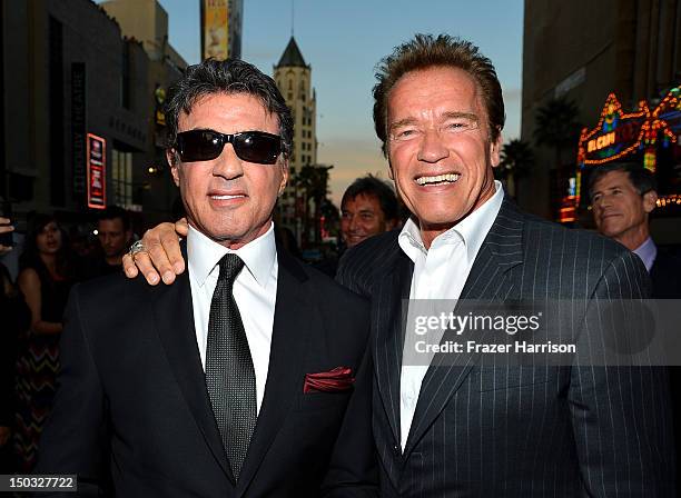 Actor/Writer/Director Sylvester Stallone and actor Arnold Schwarzenegger arrive at Lionsgate Films' "The Expendables 2" premiere on August 15, 2012...