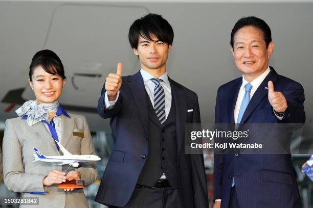 Kaoru Mitoma and Shinichi Inoue ANA President and ANA staff pose a press conference on the sponsorship with All Nippon Airways at Haneda Airport on...