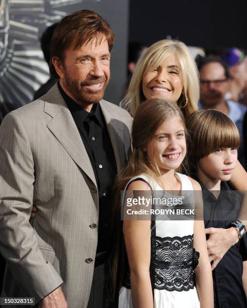 Cast member Chuck Norris arrives with his wife Gena O'Kelly and their children at the film premiere of "The Expendables 2" at Grauman's Chinese...