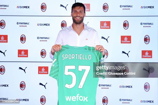 Milan new signing Marco Sportiello poses with his new jersey at Casa Milan on June 27, 2023 in Milan, Italy.