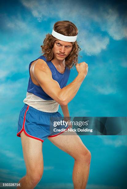 retro sport 70 - man in tank top stock pictures, royalty-free photos & images