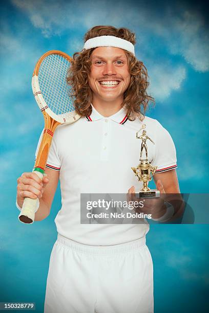 retro sport 65 - holding tennis racquet stock pictures, royalty-free photos & images