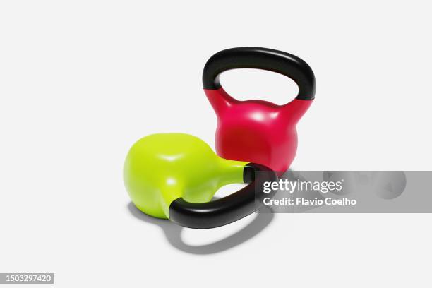 two kettlebells on white background - gym equipment red stock pictures, royalty-free photos & images