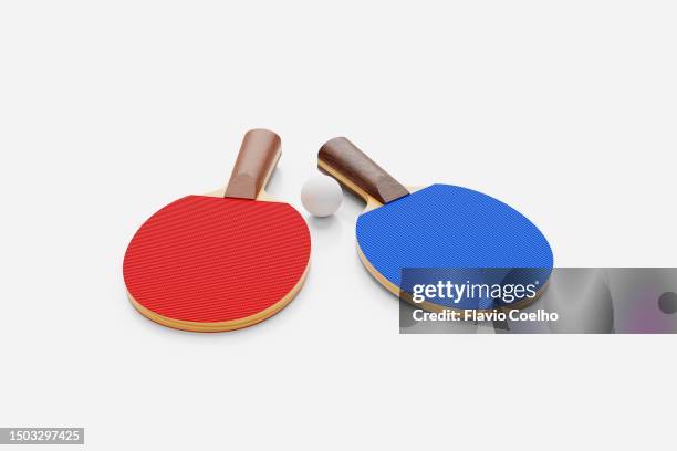 two table tennis rackets and a table tennis ball - tennis ball white background stock pictures, royalty-free photos & images