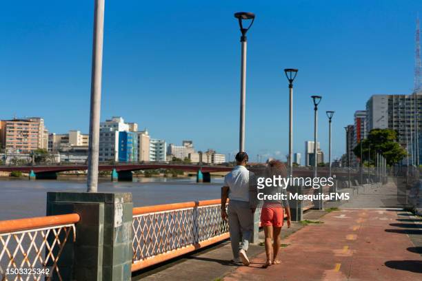 couple walking in recife city - recife stock pictures, royalty-free photos & images