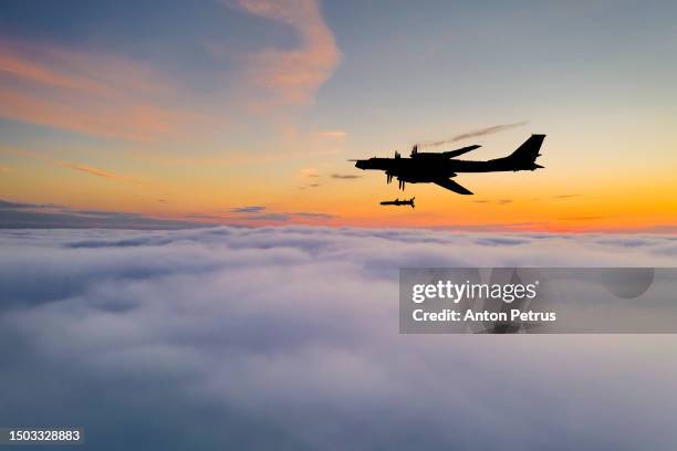 russian strategic bomber above the clouds - missile defense command stock pictures, royalty-free photos & images